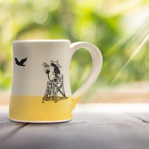 The most important moment in all of American history is portrayed on this handmade mug: vigilant hedgehog at the beach looking for the British armada. Gold accent color.The most important moment in all of American history is portrayed on this handmade mug: vigilant hedgehog at the beach looking for the British armada. Gold accent color.