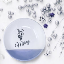 Handmade salad plate with drawing of a bee in a Santa hat and the word Merry. Lavender accent color