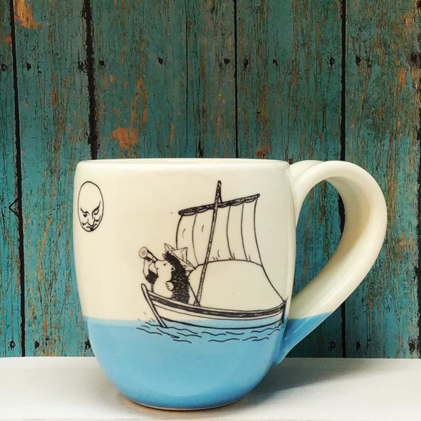 Handmade ceramic cocoa mug with drawing of hedgehog on a ship