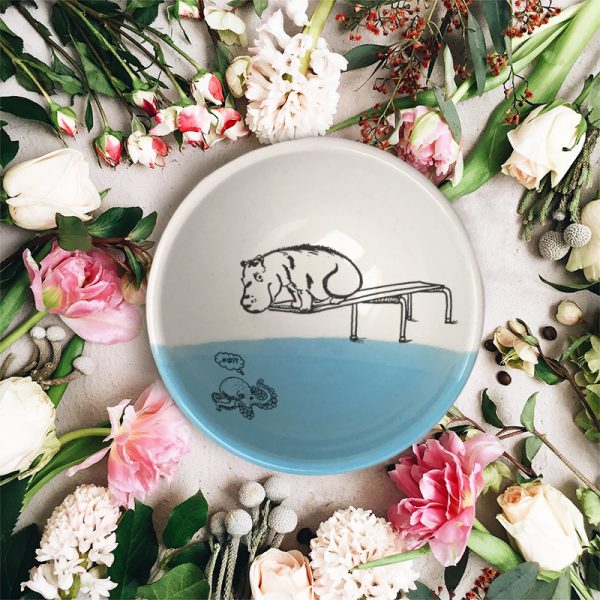 A hippo on a diving board. A little kracken understandably nervous beneath him. These emotions and more are indelibly captured on this handmade ceramic bowl. Blue accent color