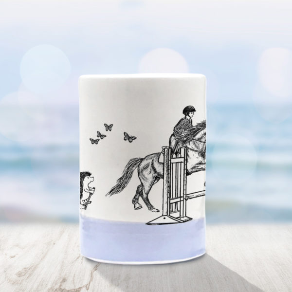 Handmade tumbler with drawing of hedgehog on a pogo stick and a horse jumping