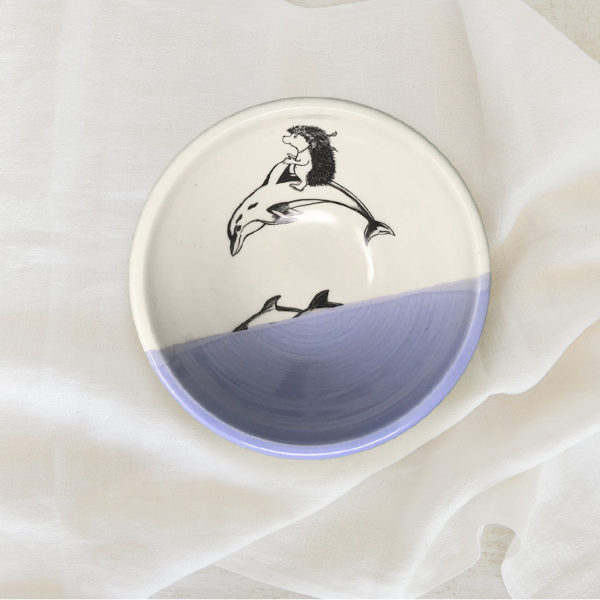 lavender soup bowl with drawing of hedgehog riding a dolphin