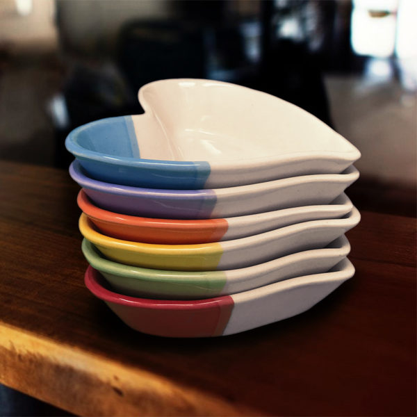 Stack of handmade heart-shaped dishes