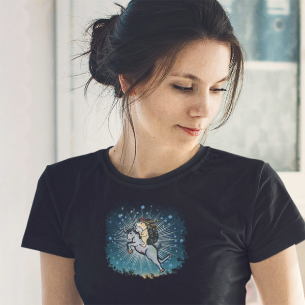 Woman wearing graphic T-shirt with drawing of a hedgehog flying on a magic goat