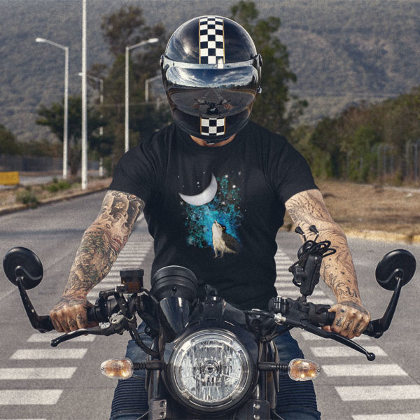Man on motorcycle wearing graphic T-shirt with original drawing of wild hedgehog howling at the moon