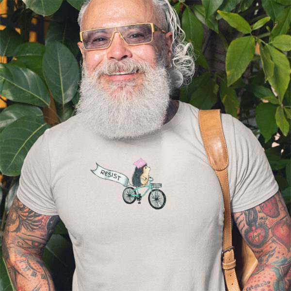 Man wearing graphic T-shirt with original drawing of a Resistance protester hedgehog on a bike