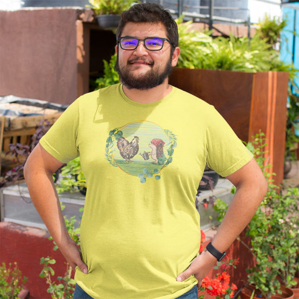 Man wearing graphic T-shirt with original drawing of a rooster and hedgehog in the garden