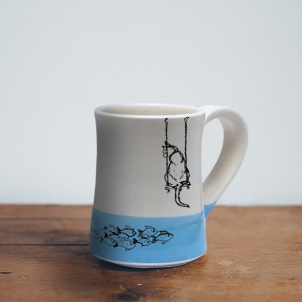 Coffee Mug created and illustrated by Darn Pottery hedgehogs depicts a tender moment between a feline and her breakfast. Blue accent color. For the cat lovers.