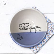 A hippo on a diving board. A little kracken understandably nervous beneath him. These emotions and more are indelibly captured on this handmade ceramic bowl. Lavender accent color
