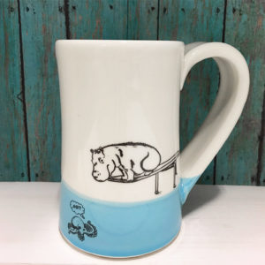 Handmade coffee mug with drawing of hippo on a diving board