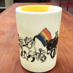 handmade ceramic cup with drawing of animals carrying a pride flag and celebrating