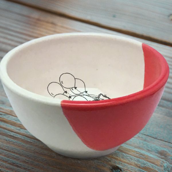 Side view of Darn Pottery Soup Bowl. Red accent color.